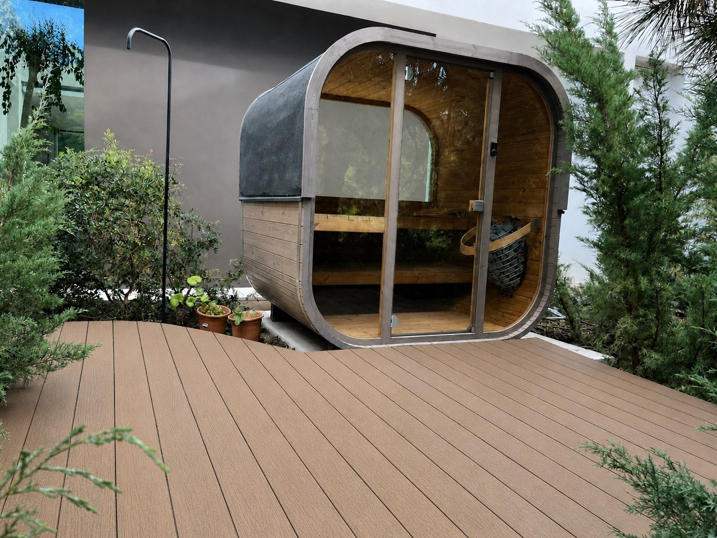 Clean composite garden deck around a sauna in Benahavis