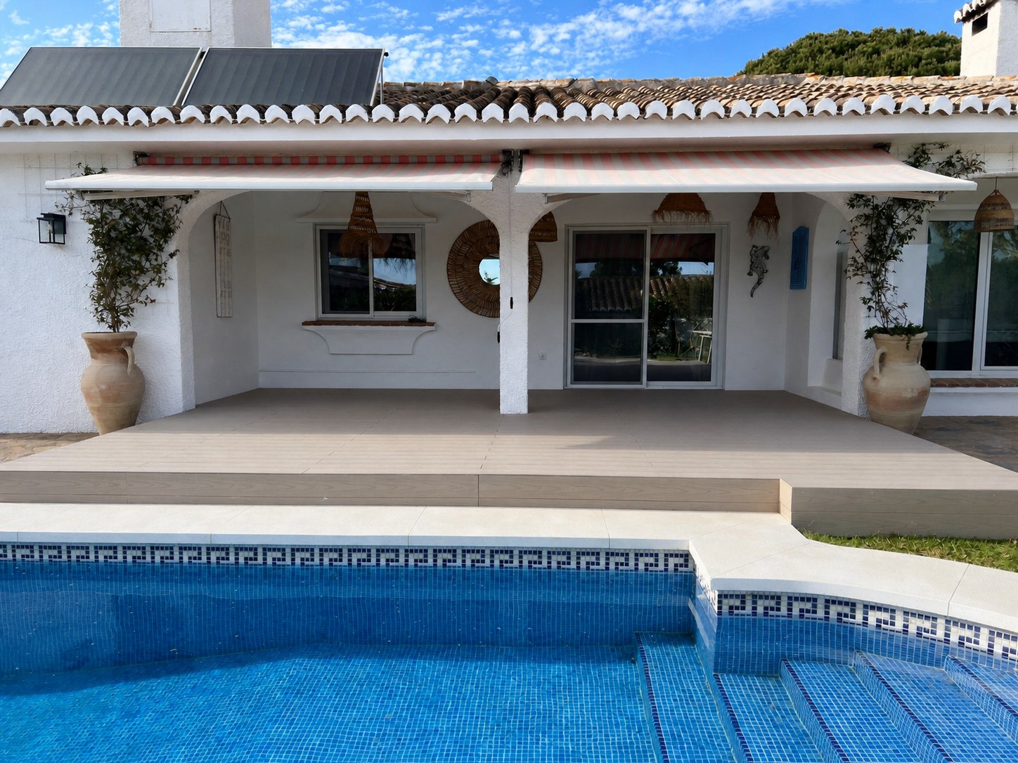 Composite deck beside a residential pool in Calahonda