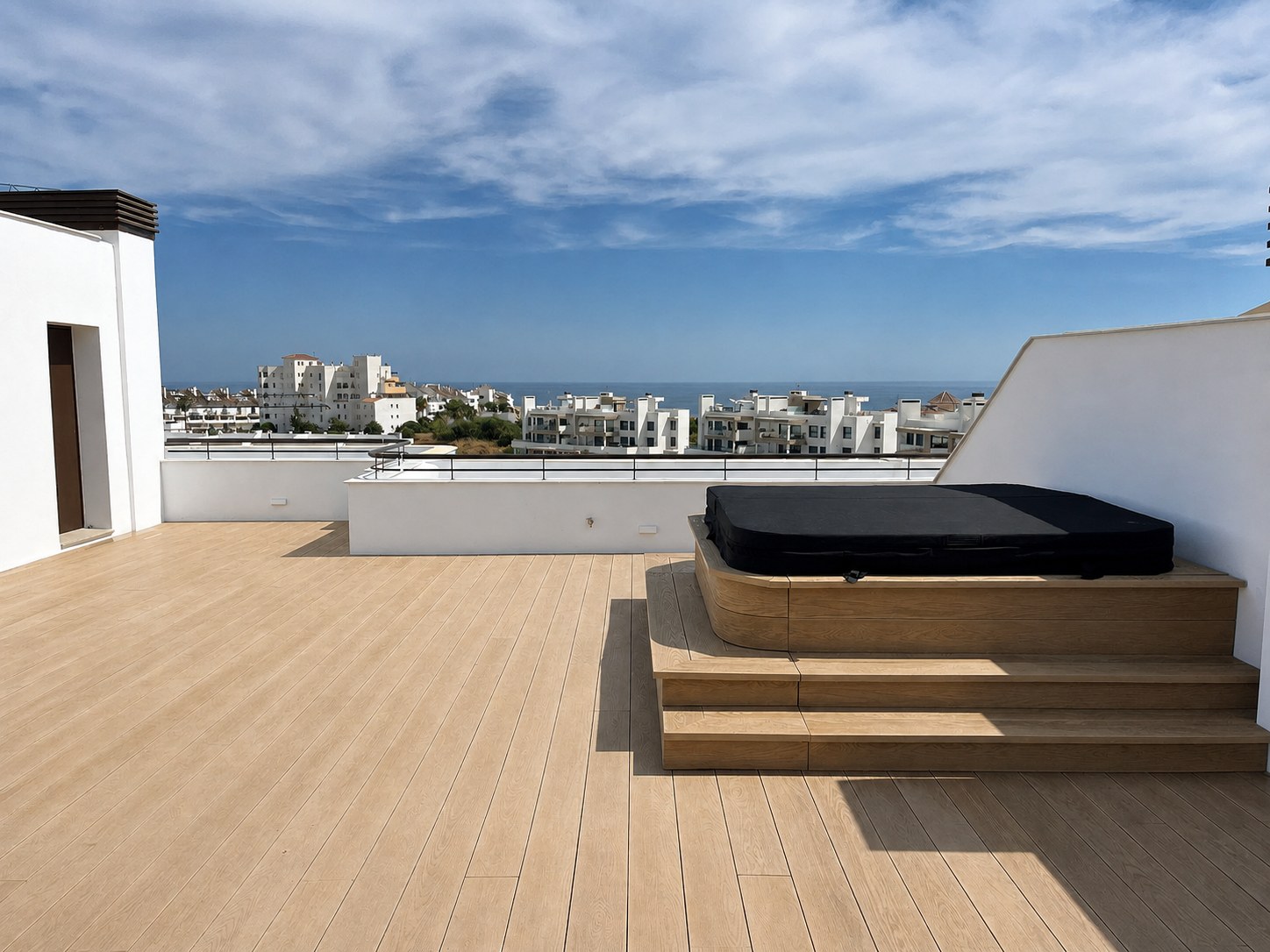 Clean rooftop composite deck with sea views in Estepona