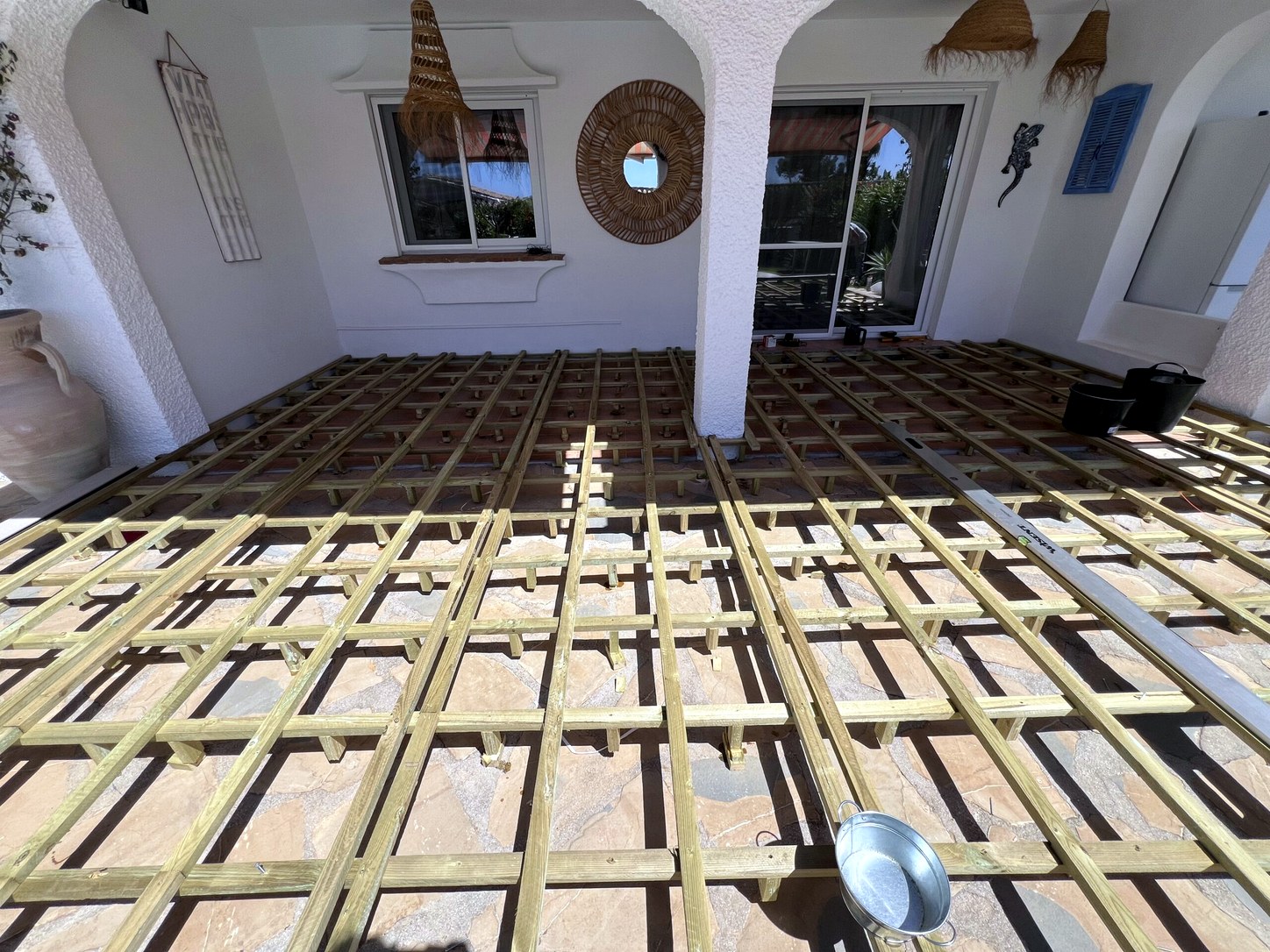 Before decking replacement in Calahonda: Exposed treated-pine substructure