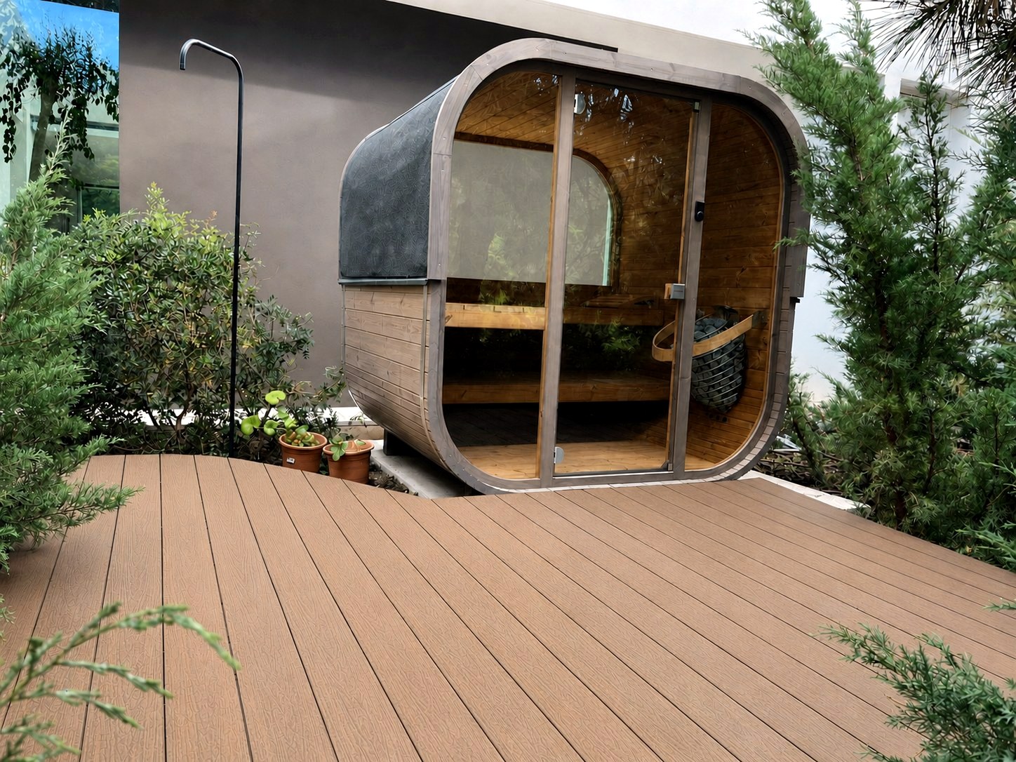 Composite terrace built around a garden sauna in Alcuzcuz