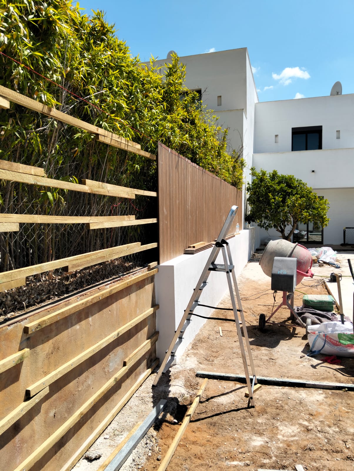 Timber support frame being installed beneath a deck