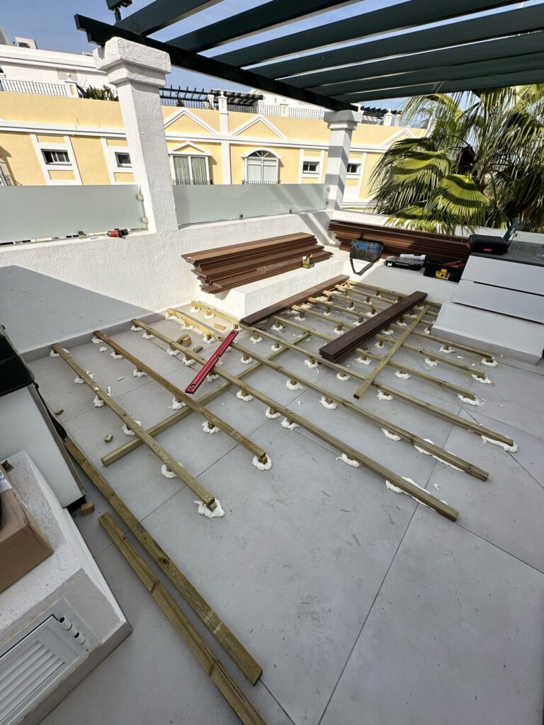 Aloha Gardens decking project photo in Nueva Andalucia