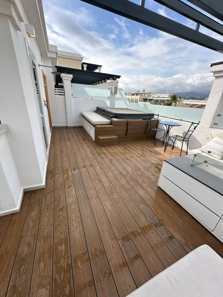 Aloha Gardens decking project photo in Nueva Andalucia