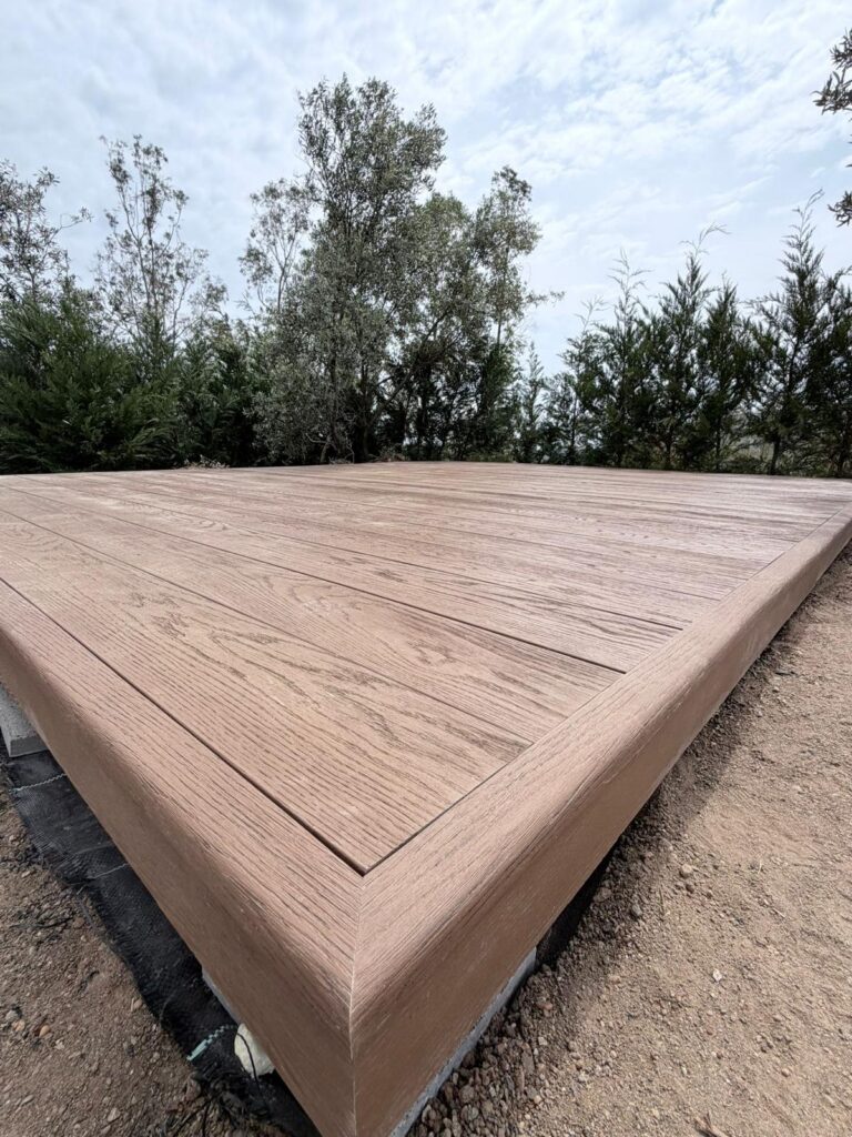 Finished corner detail on a Millboard Coppered Oak deck in Istán